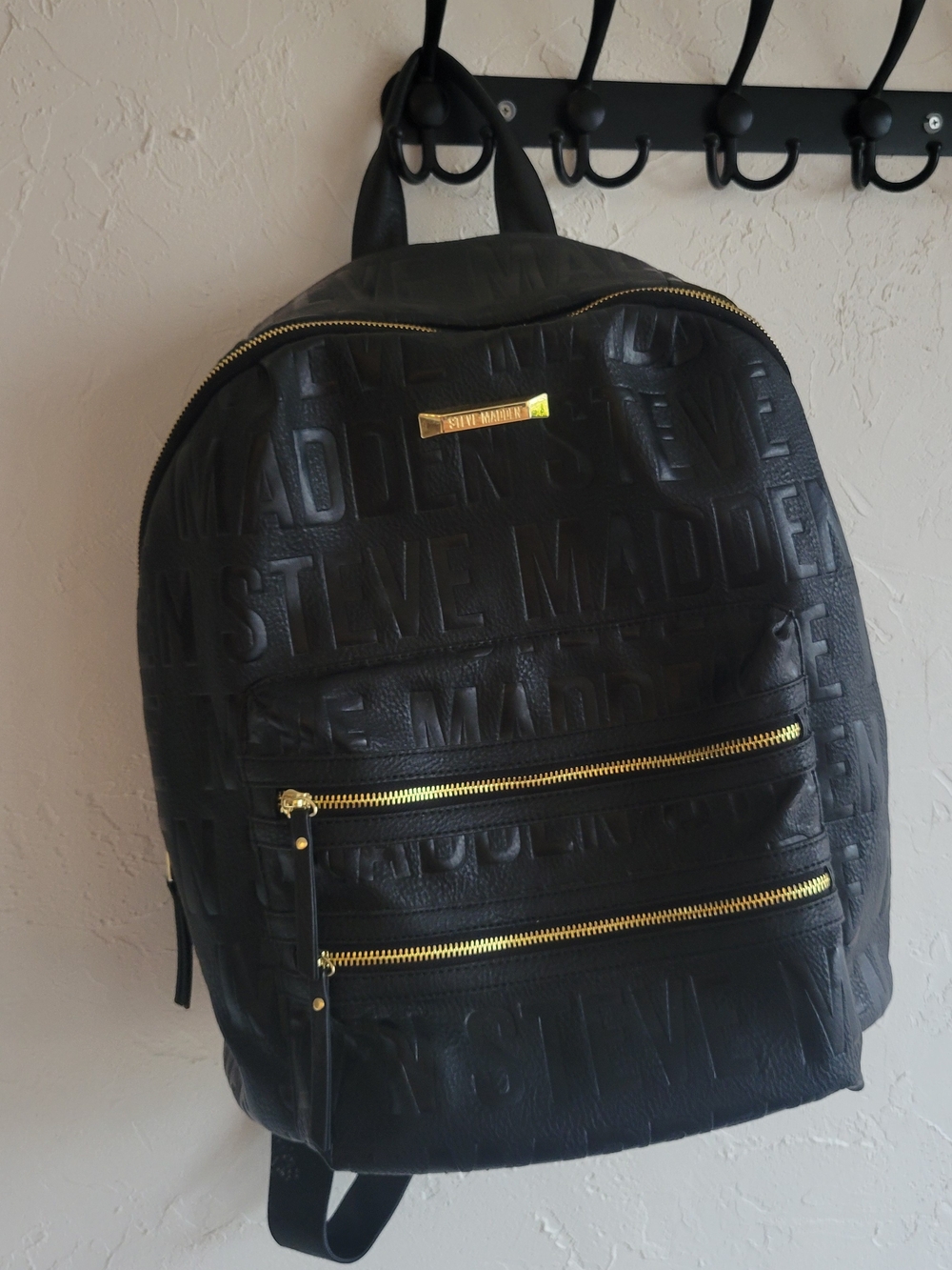 Steve Madden Black Embossed Logo Backpack